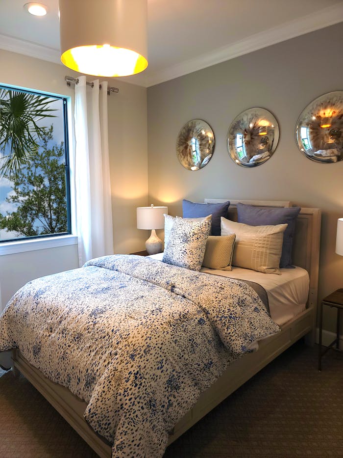 Cozy and elegant bedroom interior with modern decor elements and natural lighting.